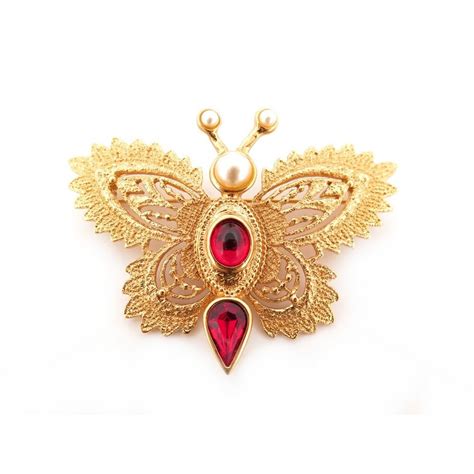 broche yves saint laurent pas cher|Brooches Yves Saint Laurent for women .